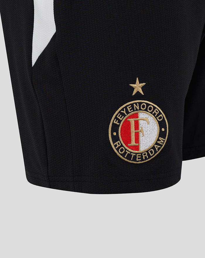 Close up of the gold star and Feyenoord crest on the left leg of the black home shorts