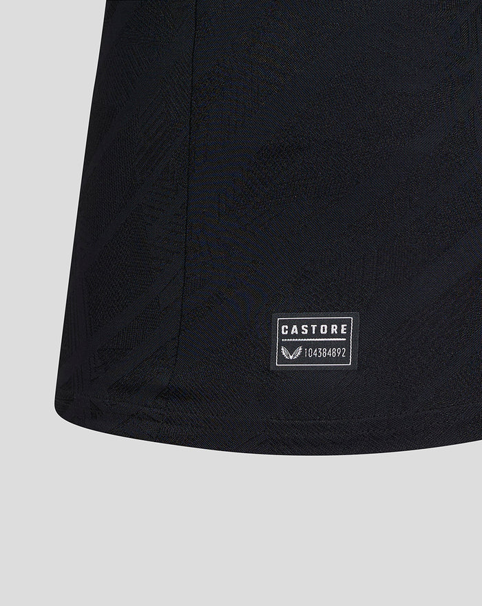 Close up of black Feyenoord Pro away shirt fabric with Castore patch