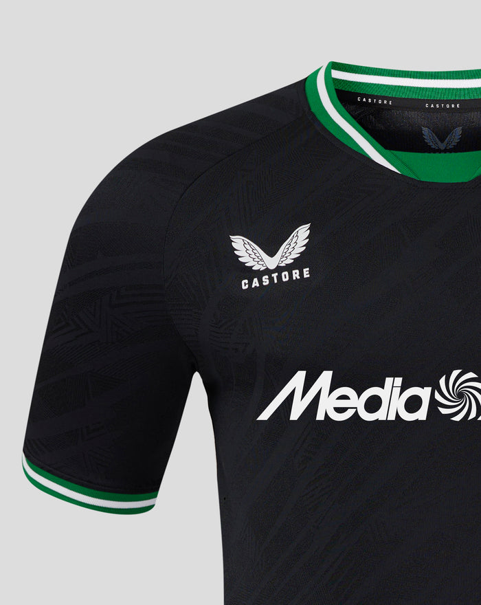 Detail of upper chest and collar on Feyenoord Pro shirt with crest on left chest and green white collar trim.