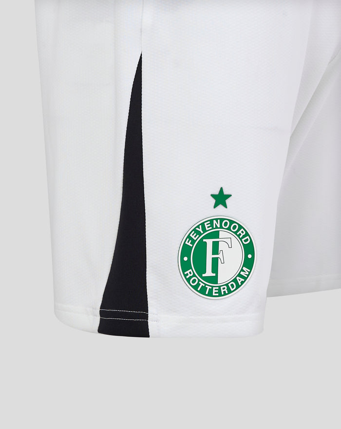 Close up front of white shorts displaying the Feyenoord badge on the right leg and Castore emblem on the left leg.