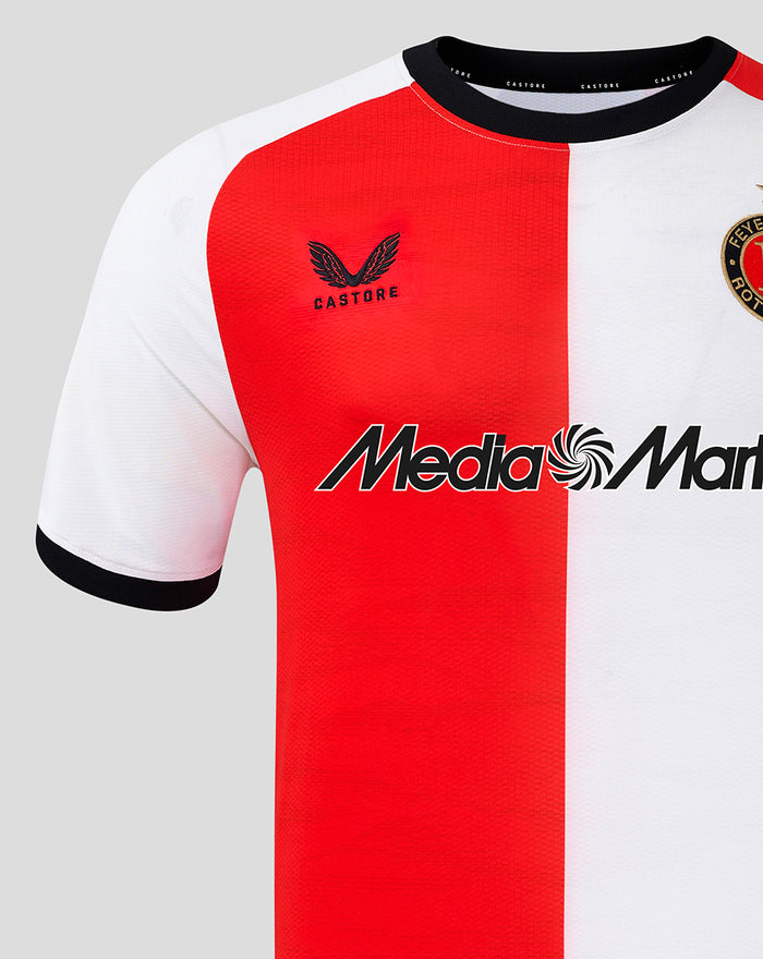 Front close up of Feyenoord home shirt with red and white split, club crest on the right chest and Castore logo on the left
