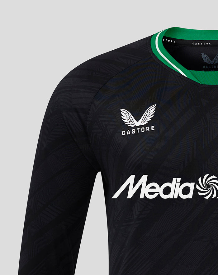 Close-up of a black Feyenoord long sleeve away shirt with a green collar, showing the Castore logo on the right chest and the Feyenoord emblem on the left chest