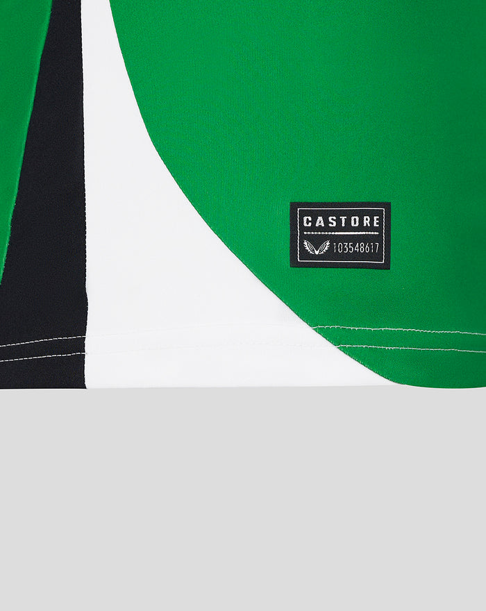 Close-up of green Feyenoord third shirt fabric with Castore label.