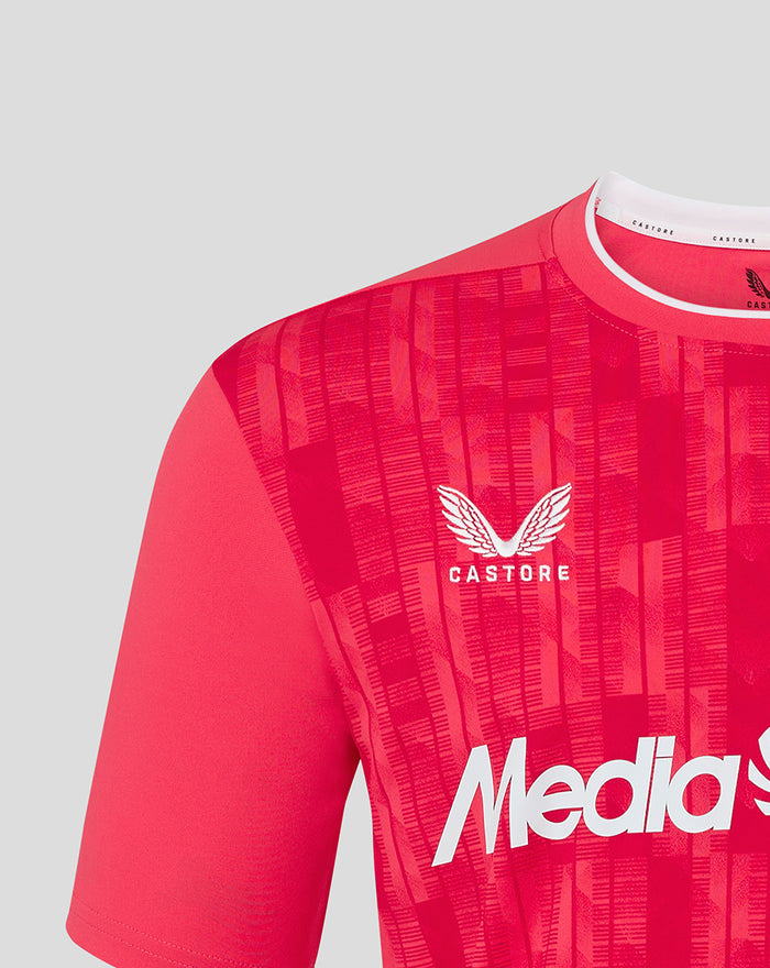 Shoulder and chest close-up of the pink Feyenoord Pro Keeper Third Shirt with the club crest and abstract pattern.