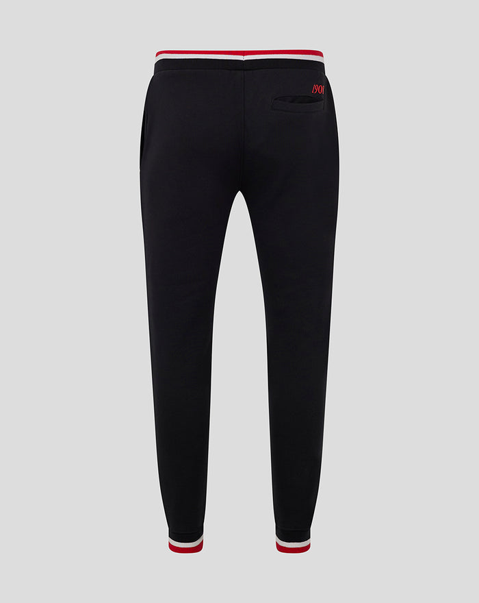Back view of black Feyenoord classic men joggers with striped red white waistband and cuffs