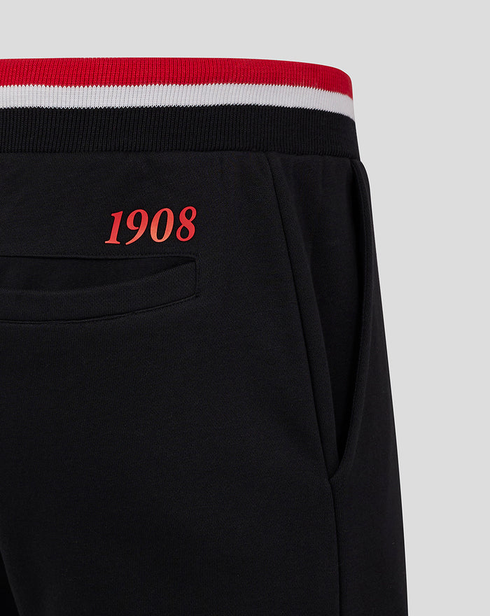 Detail of back pocket on black Feyenoord joggers with red 1908 text