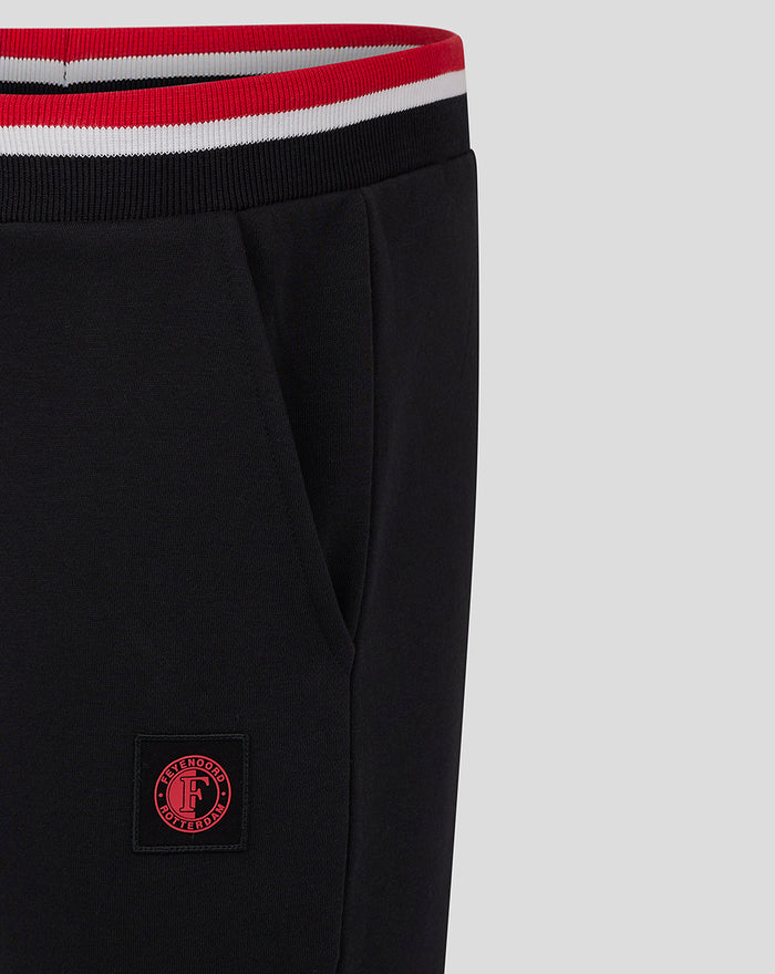 Close up of black Feyenoord joggers waistband showing red white stripe detail and 1908 branding