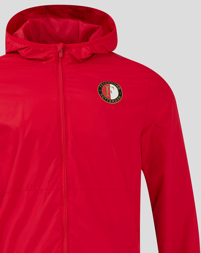 Close-up of red Feyenoord Core summer jacket with crest on the chest
