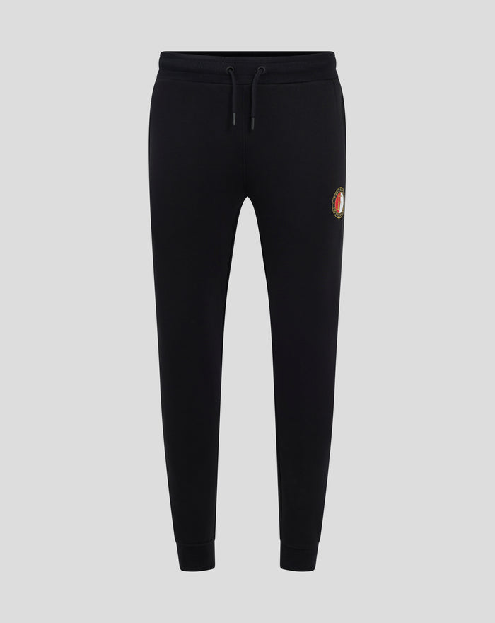 Front view of black Feyenoord Core joggers for men with drawstring waist and crest badge on the thigh.
