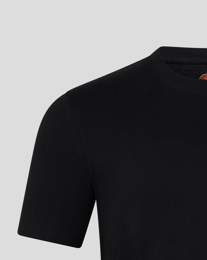 Close-up of the neckline with a small crest near the collar on a black Feyenoord Core T-shirt