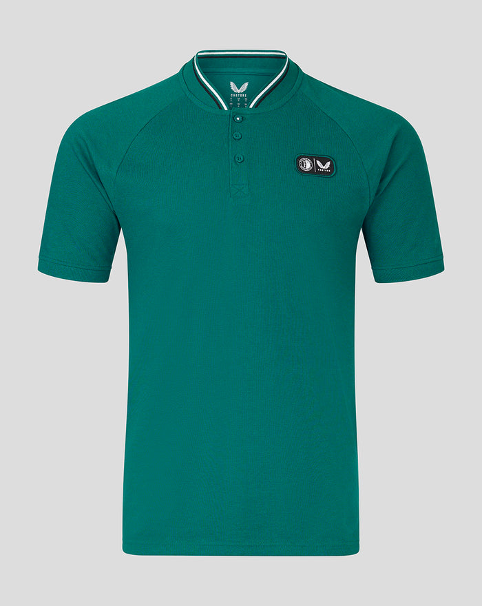Teal men's polo with button placket and team crest on the chest.