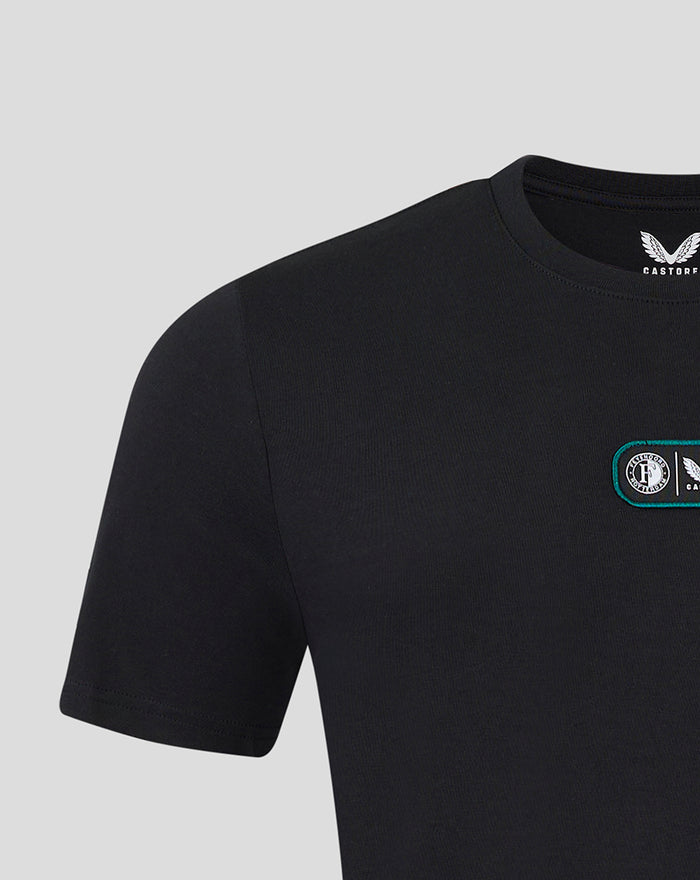 Close up of black Feyenoord x Castore T shirt showing chest patch and Castore label at neckline