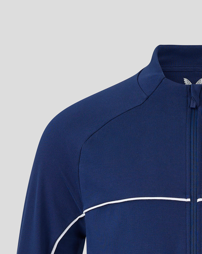 Feyenoord x Castore blue training top close up showing zipper and white piping.