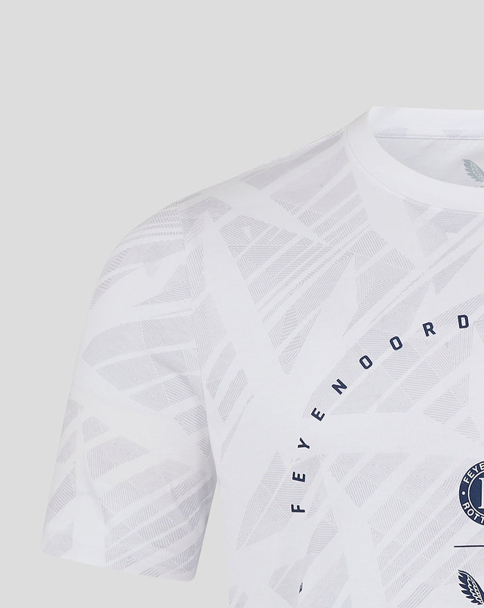 Shoulder sleeve close up of white Feyenoord Castore T shirt with geometric pattern and a small circular patch