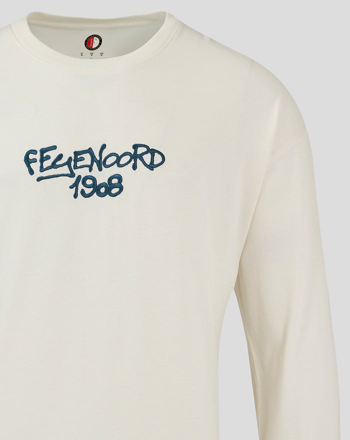 Left chest area of cream Feyenoord long sleeve T shirt with blue FEYENOORD 1908 embroidery