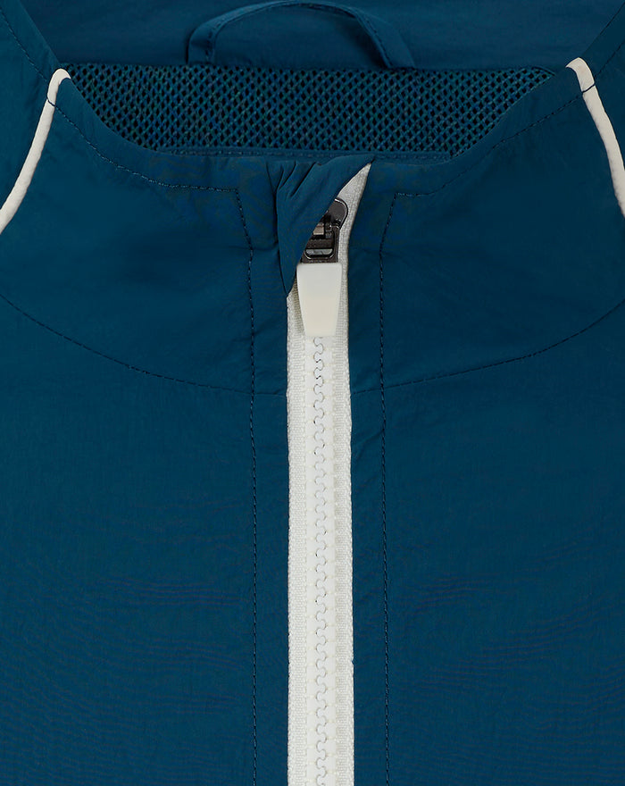 Close-up of blue Feyenoord training jacket zipper with white tape and inner mesh collar