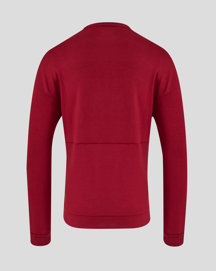 Achterkant van rode Feyenoord Travel crewneck sweater met subtiel clublogo zichtbaar onderaan