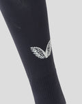 Navy Feyenoord outkousen close-up showing Castore logo on the calf and the F on the shin