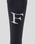 Navy Feyenoord outkousen close-up with a large white F on the shin and Castore logo on the calf