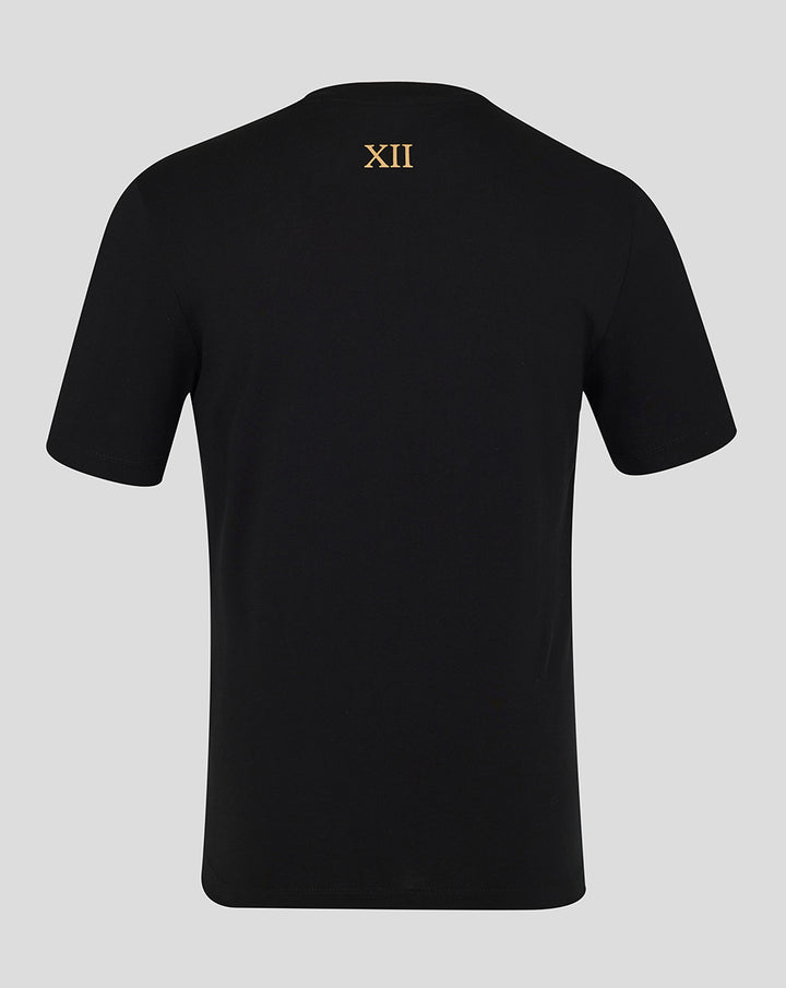 Back view of black T-shirt with gold XII emblem at the upper back.