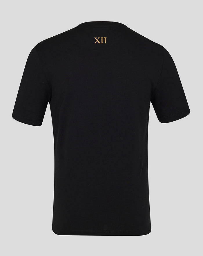 Back view of black T-shirt with gold XII emblem at the upper back.