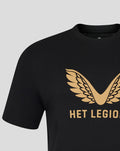 Close up of black T-shirt with gold wing emblem and bold gold text across the chest.
