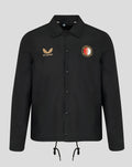 Front view of black walkout jacket with gold wing logo on left chest and Feyenoord crest on the right chest