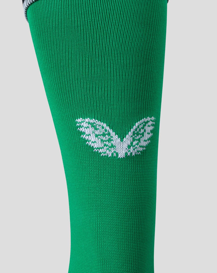 Detail of green Feyenoord Derde Kousen with a white wing emblem on the calf.