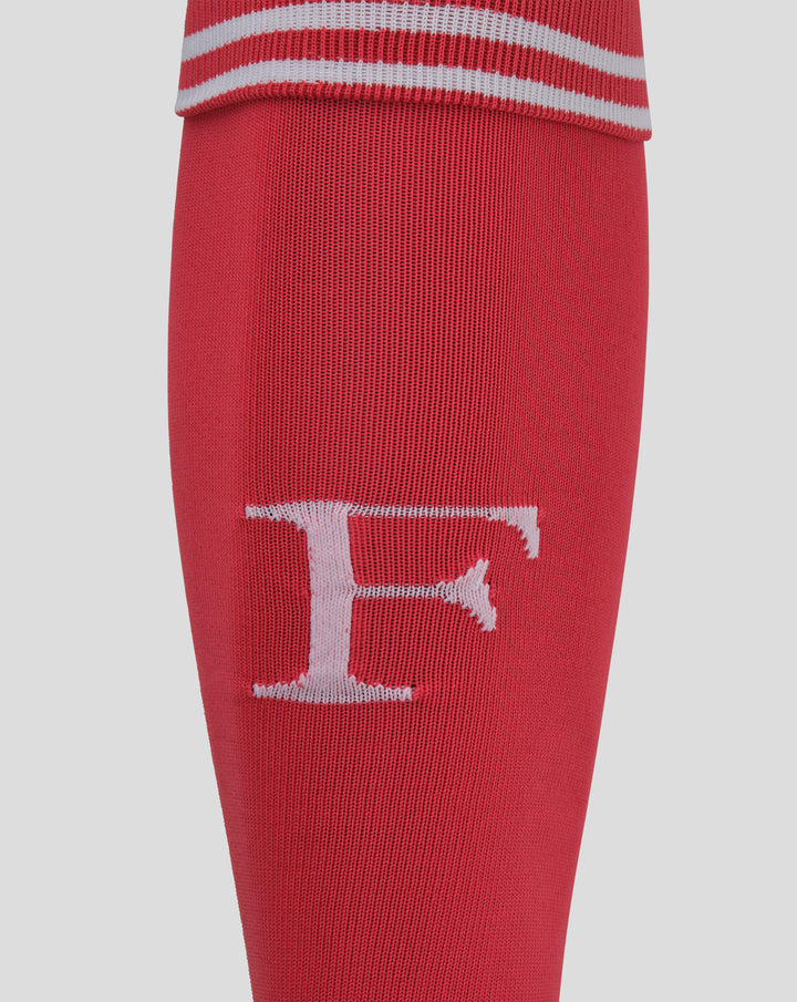 Close up of red keeper sock showing white graphic print and ribbed cuff