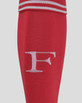 Close up of red keeper sock showing white graphic print and ribbed cuff
