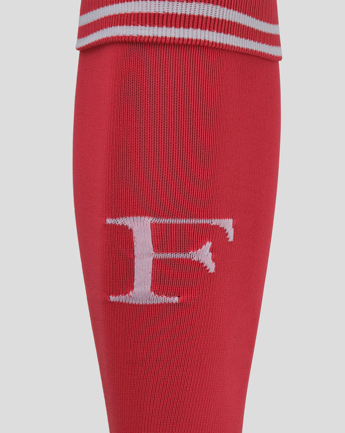 Close up of red keeper sock showing white graphic print and ribbed cuff