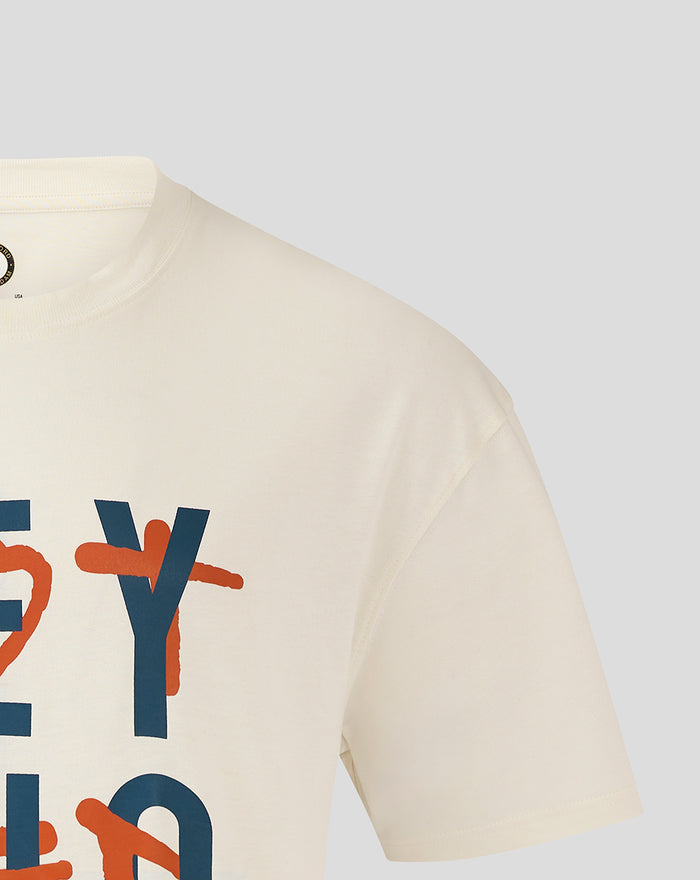 Close up of upper front of white Feyenoord T shirt showing blue lettering and orange graphic