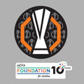 Europa League badge with trophy silhouette inside a dark circle and orange outlines, plus UEFA Foundation for Children 10 Years logo.